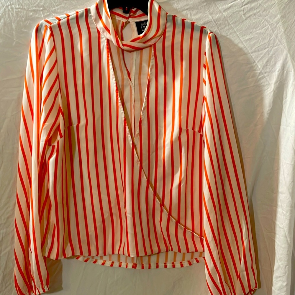 A size large, orange, and white, beautifully detailed parallel lines